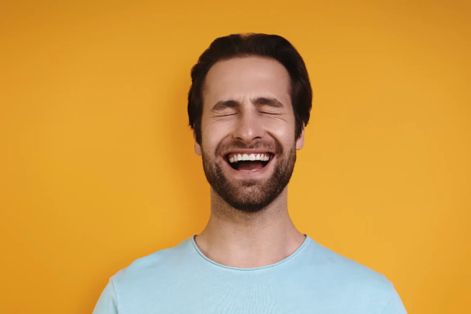 portrait of happy young man in casual clothing kee utc